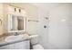 Bright bathroom featuring a walk-in shower with decorative white subway tile and updated vanity at 5140 Alderman Rd, Lakeland, FL 33810