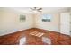 Bedroom with patterned wood floor and natural light at 5140 Alderman Rd, Lakeland, FL 33810