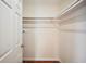 Walk-in closet with built-in shelving and ample storage space at 5140 Alderman Rd, Lakeland, FL 33810