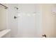 Bright bathroom featuring a walk-in shower with decorative white subway tile at 5140 Alderman Rd, Lakeland, FL 33810