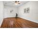 Bedroom featuring hardwood floors, ceiling fan and natural light at 545 Prado Pl, Lakeland, FL 33803