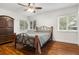 Bedroom showcasing gleaming hardwood floors and natural lighting at 545 Prado Pl, Lakeland, FL 33803
