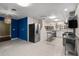 Kitchen featuring stainless steel appliances, custom cabinets, and patterned flooring at 545 Prado Pl, Lakeland, FL 33803