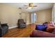 Spacious living room with hardwood floors and neutral wall color at 545 Prado Pl, Lakeland, FL 33803