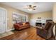 Inviting living room with hardwood floors, fireplace and large window at 545 Prado Pl, Lakeland, FL 33803