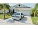 Charming single-story home with a well-maintained lawn and a two-car garage at 550 Patton Loop, Bartow, FL 33830