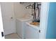 Functional laundry room with washer and dryer at 550 Patton Loop, Bartow, FL 33830