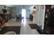 Open-concept living area with neutral tones and lots of natural light at 550 Patton Loop, Bartow, FL 33830