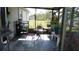 Inviting screened-in porch with comfortable seating, perfect for outdoor relaxation at 550 Patton Loop, Bartow, FL 33830