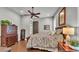 Cozy bedroom with hardwood floors, stylish furniture, and lots of space at 6475 Avalon Woods Dr, Lakeland, FL 33813