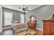 Bedroom featuring neutral colors and natural light at 6475 Avalon Woods Dr, Lakeland, FL 33813