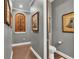 Hallway featuring hardwood floors and decorative art at 6475 Avalon Woods Dr, Lakeland, FL 33813