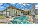 Inviting screened pool area with comfortable seating and a sunny ambiance for relaxation and outdoor enjoyment at 6475 Avalon Woods Dr, Lakeland, FL 33813