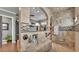 Shower with tiled walls, bench, and multiple shower heads at 6475 Avalon Woods Dr, Lakeland, FL 33813