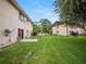 Property featuring a spacious backyard area with privacy at 803 Orchid Springs Dr, Winter Haven, FL 33884