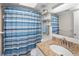 Bathroom featuring vanity, shower, and ample lighting at 803 Orchid Springs Dr, Winter Haven, FL 33884