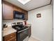 Modern kitchen with stainless steel appliances and granite countertops at 803 Orchid Springs Dr, Winter Haven, FL 33884