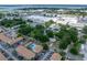 Aerial view of property surrounded by lush trees in a suburban neighborhood at 829 N Lake Ave, Lakeland, FL 33801