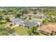 The aerial view shows a home with a backyard pool, surrounded by a fence, in a neighborhood at 934 Point View Ln, Lakeland, FL 33813