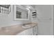 Bathroom with vanity, sink and a large mirror above at 934 Point View Ln, Lakeland, FL 33813