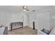 Bright Bedroom with a crib, chair, dresser, and natural lighting from two windows at 934 Point View Ln, Lakeland, FL 33813