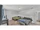 Bright bedroom featuring neutral decor, two beds, and large window at 934 Point View Ln, Lakeland, FL 33813