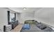 Spacious bedroom featuring two beds, neutral decor, and natural lighting at 934 Point View Ln, Lakeland, FL 33813