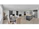 Open concept dining area with stylish furniture and lots of natural light at 934 Point View Ln, Lakeland, FL 33813