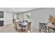 Bright dining area featuring modern decor and ample natural light from a nearby window at 934 Point View Ln, Lakeland, FL 33813