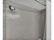 Shower featuring a tiled wall, offering a modern and clean aesthetic at 934 Point View Ln, Lakeland, FL 33813