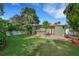 A well maintained backyard and brick paver patio in a cozy outdoor living space at 941 Avon Ave, Lakeland, FL 33801