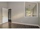Bedroom view showing hard surface floors, neutral wall color, and entryways at 102 Canterbury Dr, Haines City, FL 33844