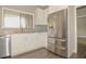 Kitchen with granite countertops and stainless steel appliances at 102 Canterbury Dr, Haines City, FL 33844