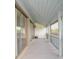 An outdoor patio is accessible through sliding glass doors at 102 Canterbury Dr, Haines City, FL 33844