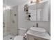 Modern bathroom featuring a walk-in shower, vessel sink, and stylish fixtures at 1020 E Palmetto St, Lakeland, FL 33801