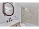 Modern bathroom with glass walk-in shower, new vanity, and contemporary finishes at 1020 E Palmetto St, Lakeland, FL 33801