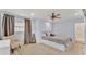 Bedroom with natural light, neutral furniture, and tiled floors at 1020 E Palmetto St, Lakeland, FL 33801