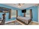 Comfortable bedroom with modern ceiling fan and neutral color scheme at 1020 E Palmetto St, Lakeland, FL 33801