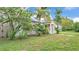 Charming one-story home with landscaped front yard and well-maintained lawn at 1020 E Palmetto St, Lakeland, FL 33801