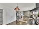 Modern kitchen with stainless steel appliances, granite countertops, and ample storage at 1020 E Palmetto St, Lakeland, FL 33801