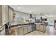 Modern kitchen with stainless steel appliances and a view into dining area at 1020 E Palmetto St, Lakeland, FL 33801