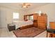 Bright and spacious main bedroom featuring lots of wooden storage at 111 Beverly Dr, Winter Haven, FL 33884