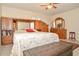Large main bedroom featuring lots of wooden storage and a ceiling fan at 111 Beverly Dr, Winter Haven, FL 33884