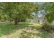 Spacious backyard is perfect for enjoying nature with plenty of greenery and ample space for recreation at 1125 Josephine St, Lakeland, FL 33815