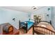 Cozy bedroom with two beds and decoratively painted walls at 1125 Josephine St, Lakeland, FL 33815