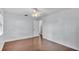 Bedroom with sleek hardwood floors and natural light at 118 Caloosa Dr, Babson Park, FL 33827