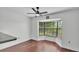 Dining area features a bay window with views and a modern ceiling fan at 118 Caloosa Dr, Babson Park, FL 33827