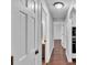 Hallway view featuring tile flooring and neutral paint at 118 Caloosa Dr, Babson Park, FL 33827