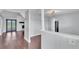 Bright open-concept living space with hardwood floors, fireplace, and modern finishes at 118 Caloosa Dr, Babson Park, FL 33827