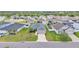 Well-maintained home with gray roof, manicured lawn, and concrete driveway in a Gathering-friendly neighborhood at 122 St Thomas Dr, Mulberry, FL 33860
